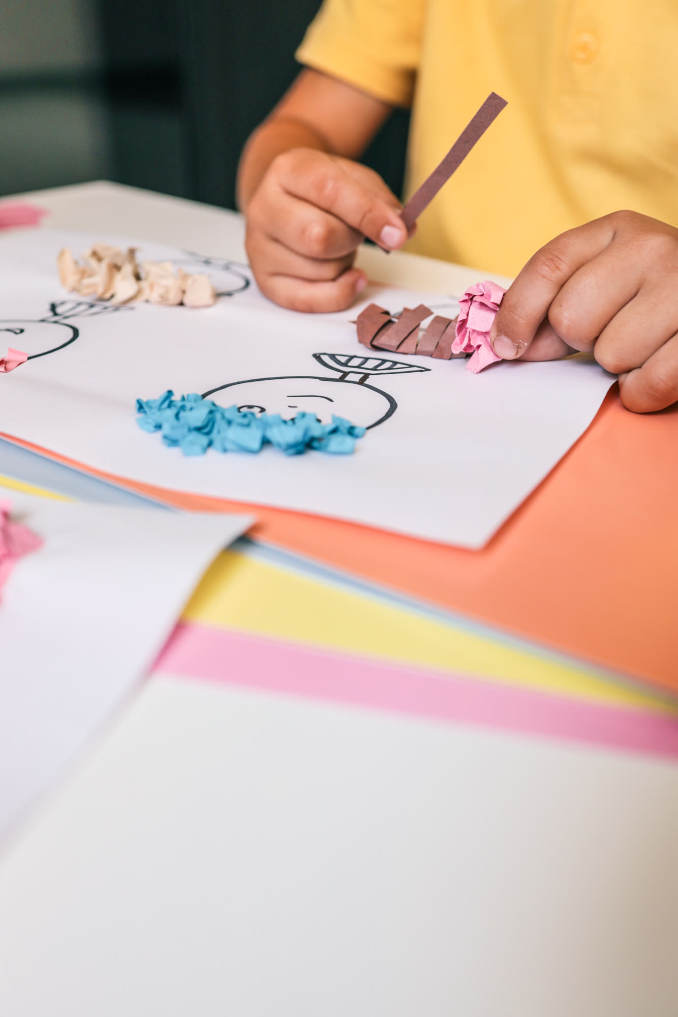 A child painting at an easel